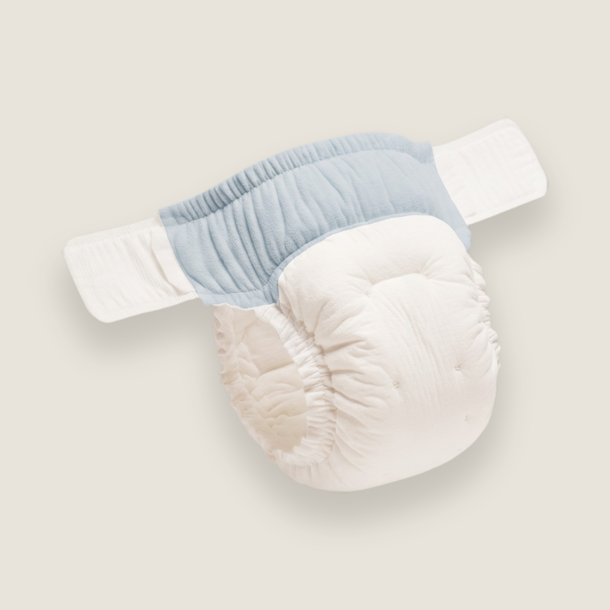 The nappy in blue, the waistband panel in dusty blue