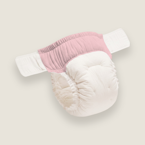 The nappy in pink, the waistband panel in dusty pink